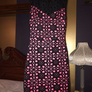 Two cute form fitting cocktail dresses.